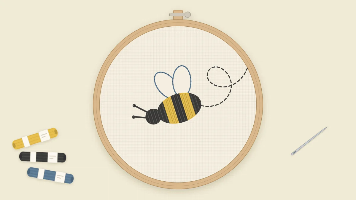 Finished tiny bee embroidery in a 3-inch hoop on cream fabric, with a dashed looping flight trail